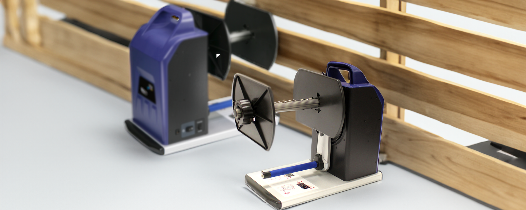 Promark RW-4 automatic label rewinder with adjustable speed for efficient label processing.